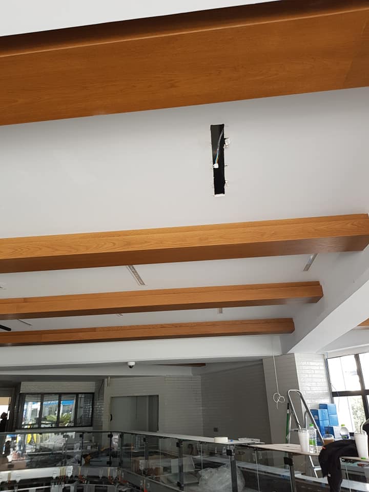 Hidden lighting wooden ceiling panels