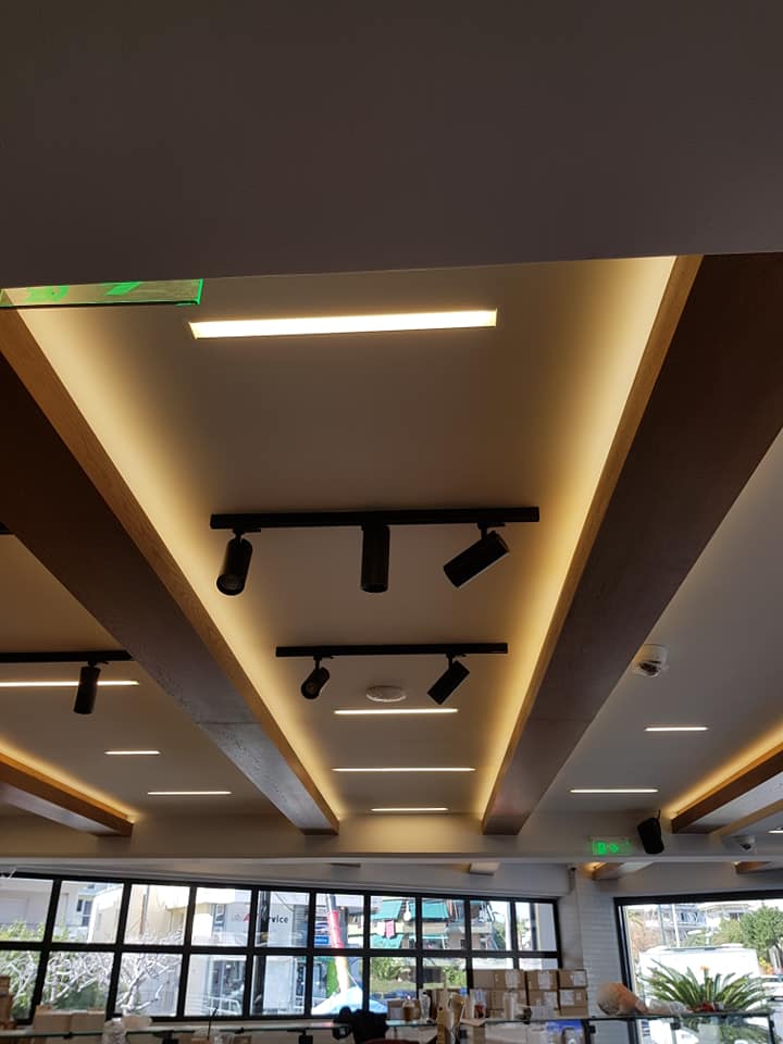 Hidden lighting wooden ceiling panels
