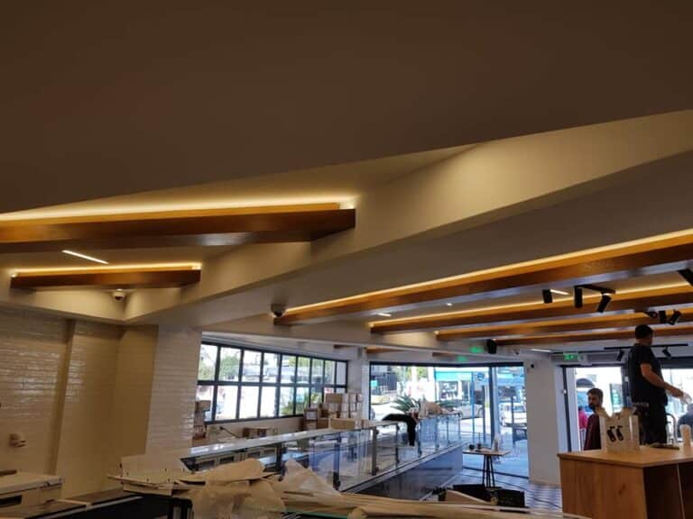 Hidden lighting wooden ceiling panels
