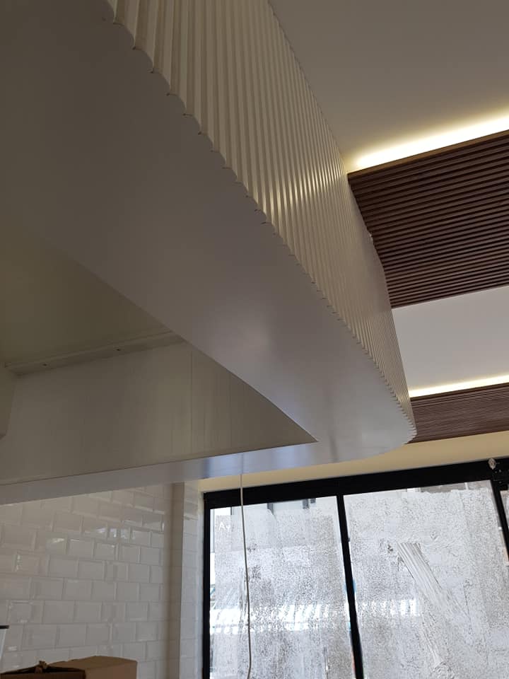 Coffee bar wall cladding